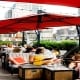 People sitting outside at Refinery Rooftop