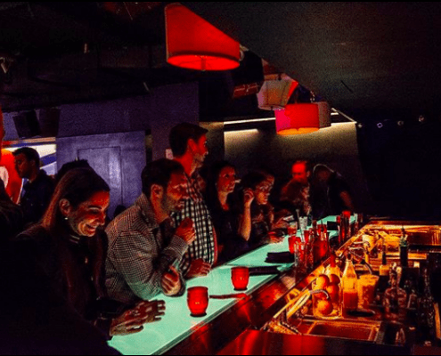 People at the lit up bar, The Boogie Room