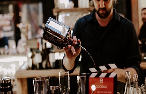 Bartender making a drink at, Refinery Rooftop