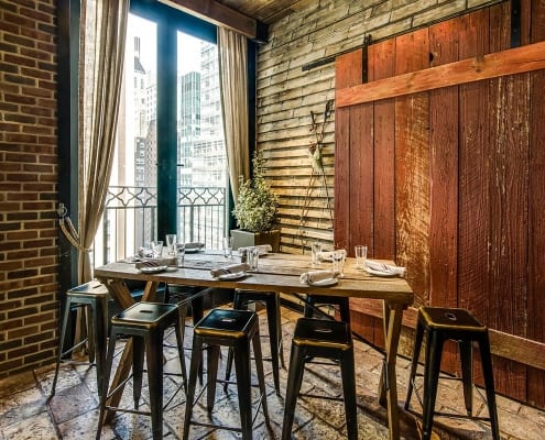 Rustic table, barn wall, Refinery rooftop